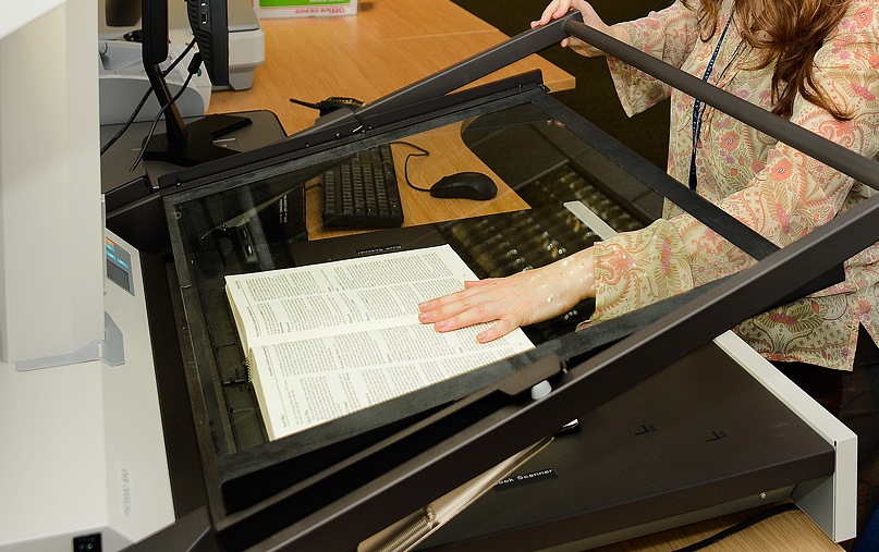 Staff member using the Bookscanner at the Library Annexe