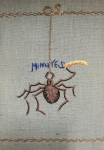 An embroidered spider motif on the front cover of the Dunfermline College of Physical Education Old Students' Association Minute Book, 1912-1973 (Ref: EUA GD55/1/1/2)