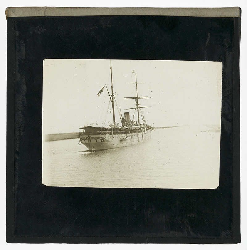 'Steamer, Suez Canal'. Photograph of a steam ship on the Suez Canal in the late 19th or early 20th century.