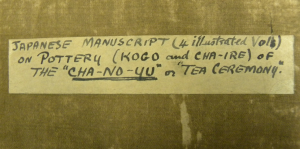 Label on the rather worn silk-covered folding slipcase (coll-1693)