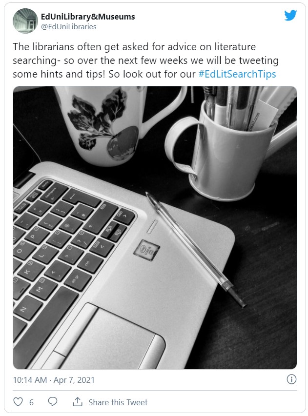 A screen capture of a tweet which features a black and white image of the corner of a laptop, a mug containing many pens and other stationery, and another mug.  The text in the tweet reads "The librarians often get asked for advice on literature searching - so over the next few weeks we will be tweeting some hints and tips! So look out for our #EdLitSearchTips".