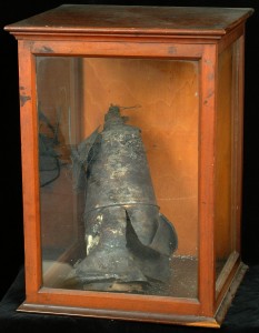 Incendiary bomb in glass display case at Lauriston Place site (LHSA object collection, O26).