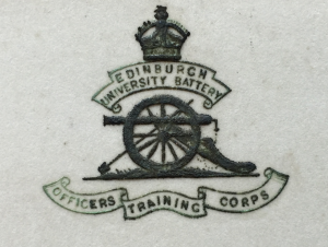 Badge of Edinburgh University Battery, Officers' Training Corps, on an invitation card inserted in 'Minute Book. Artillery Unit. Officers ' Training Corps', Dec. 1914 - Nov. 1920. EUA. Acc.99/017