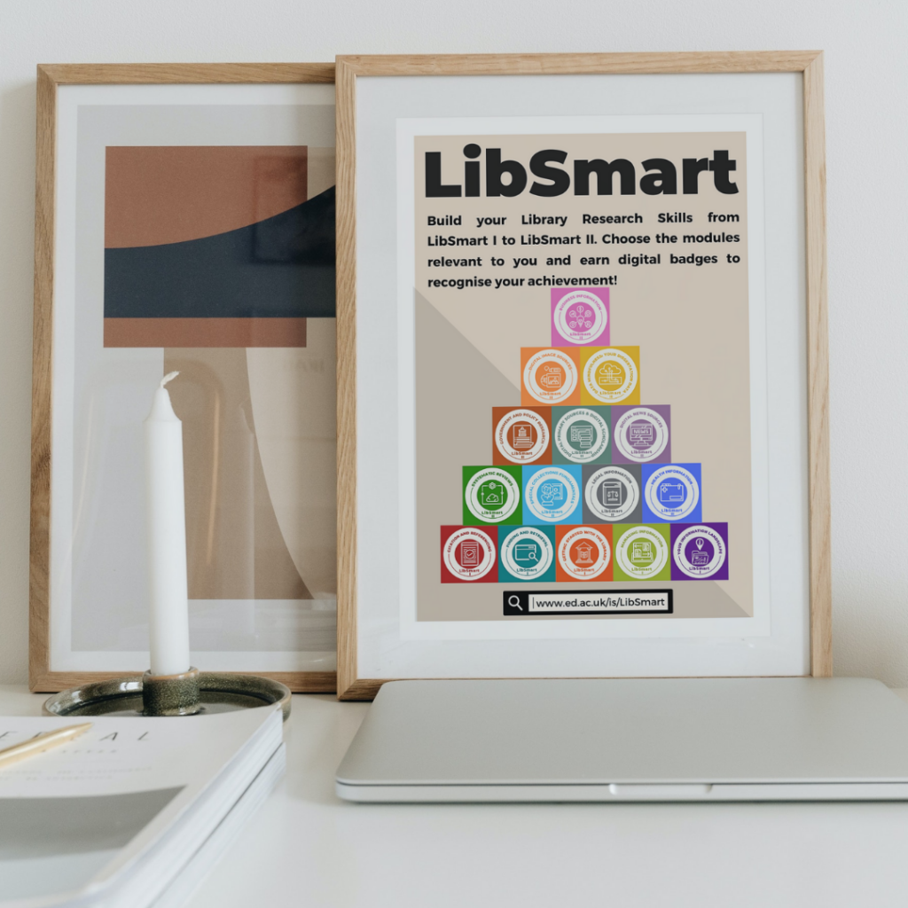 Picture of LibSmart digital badges in a wooden picture frame leaning against a wall