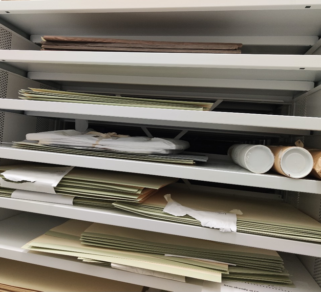 Folders on a shelf in a store room