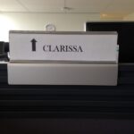 Photo of nameplate on the desk which says Clarissa