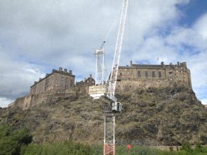 Photo of the office window view showing Edinburgh Castle obscured by a crane
