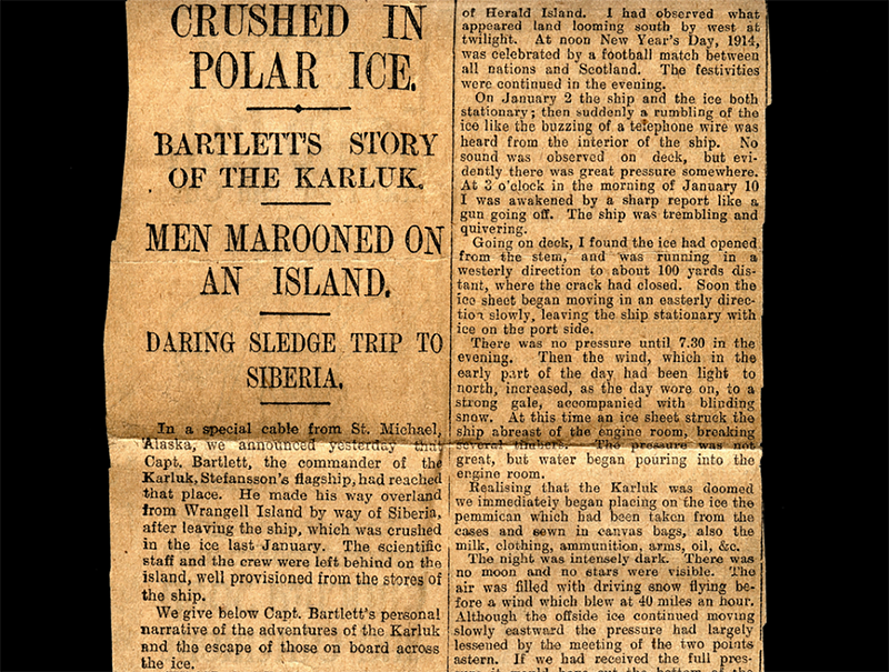 A yellowed newspaper clipping from the time, headline reads: CRUSHED IN POLAR ICE, BARTLETTS STORY OF THE KARLUK, MEN MAROONED ON AN ISLAND, DARING SLEDGE TRIP TO SIBERIA