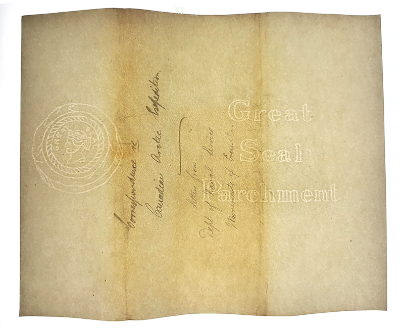 A yellowed sheet of paper with a visible watermark resembling a coin with a woman's side profile in the centre, and the words Great Seal around it.