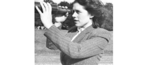 Picture of Mary Brueck looking through a telescope